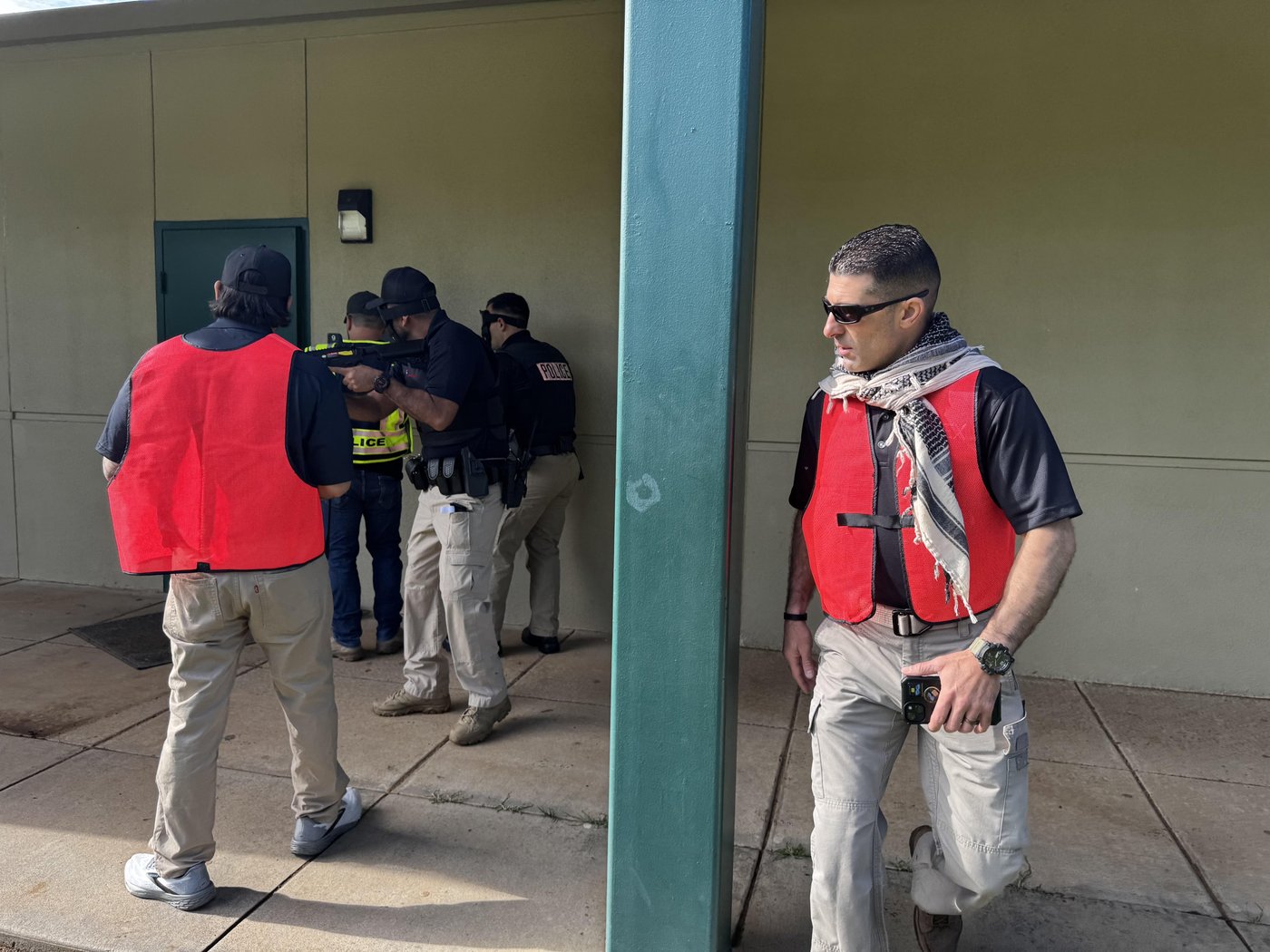 Officers practicing a response drill during an active shooter preparedness class