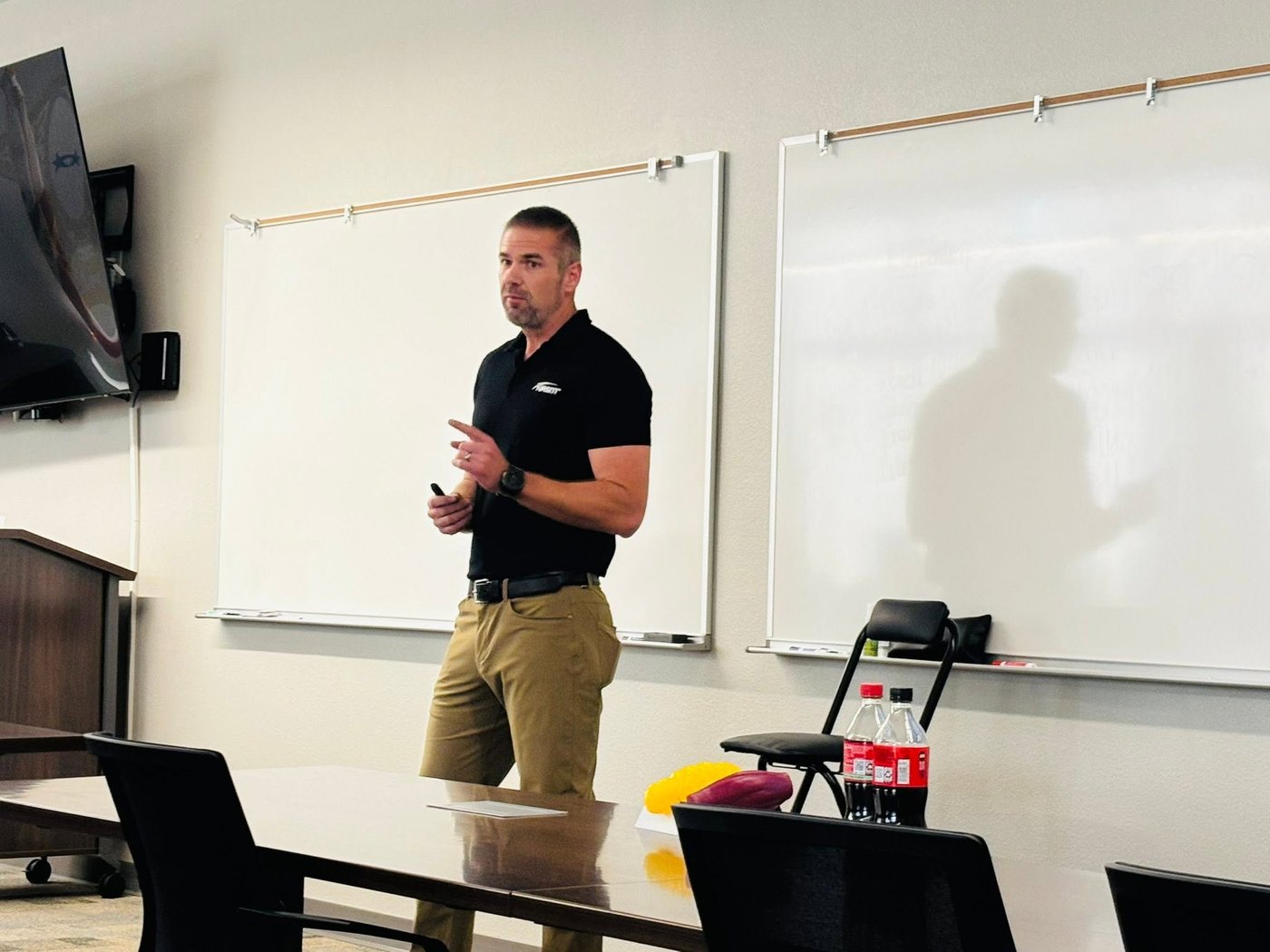 Josiah Arnold teaching a class to an organization